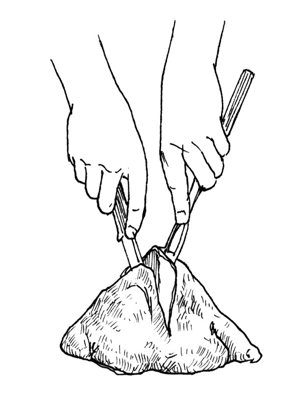 To slice the thigh meat, hold it firmly on a cutting surface with a fork. Cut even slices parallel to the bone.